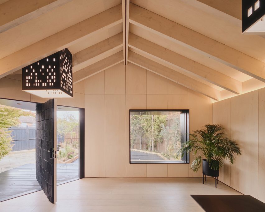 Window and pivoting door in Dark Matter garden studio by Hyper