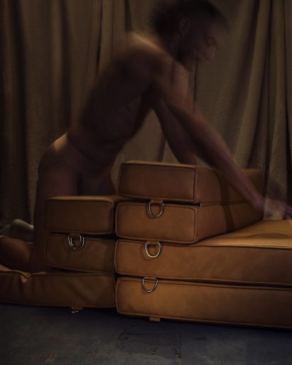Brown leatherette modules that attach to steel framework