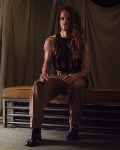 Designer Domhnall Nolan sitting on his self-designed sex furniture