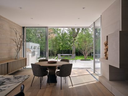 Family gathering space within 1920s cottage that transitions onto a patio