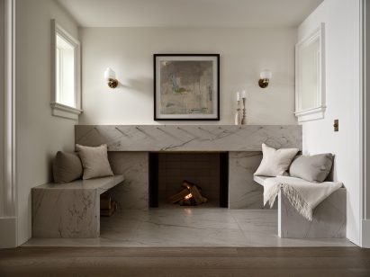 Stone-faced cabinetry in a 1920s-style cottage renovation