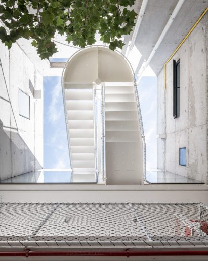 Rounded staircase with sky above
