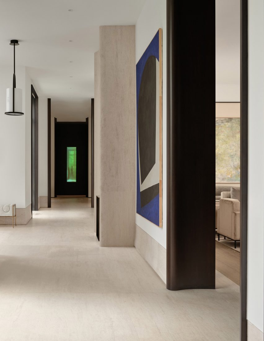 Hallway with limestone fireplace
