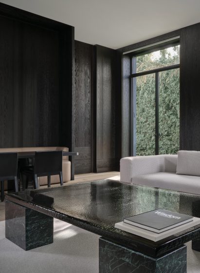 Den clad in blackened wood