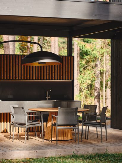 Outdoor terrace area with table and chairs
