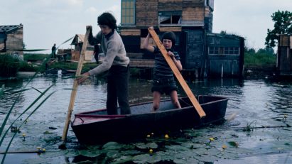 Children on a rowing boat in Jongensland, photographed by Ursula Schulz-Dornburg
