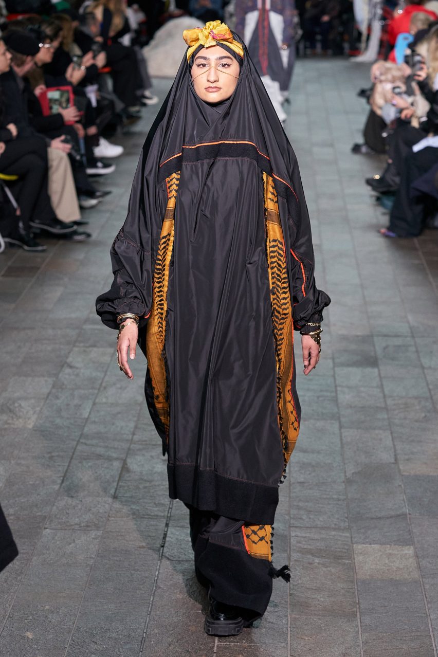 Model wearing Kazna Asker's collection on a runway