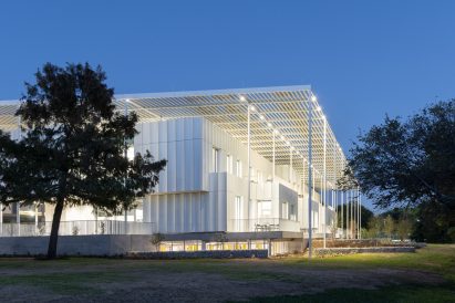 White building covered with photovoltaic panels
