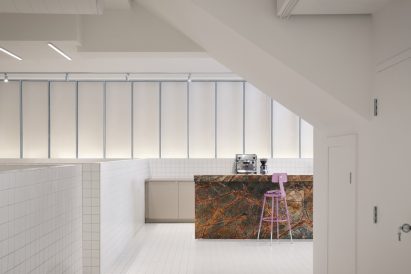 Bar counter contrasts all-white interior