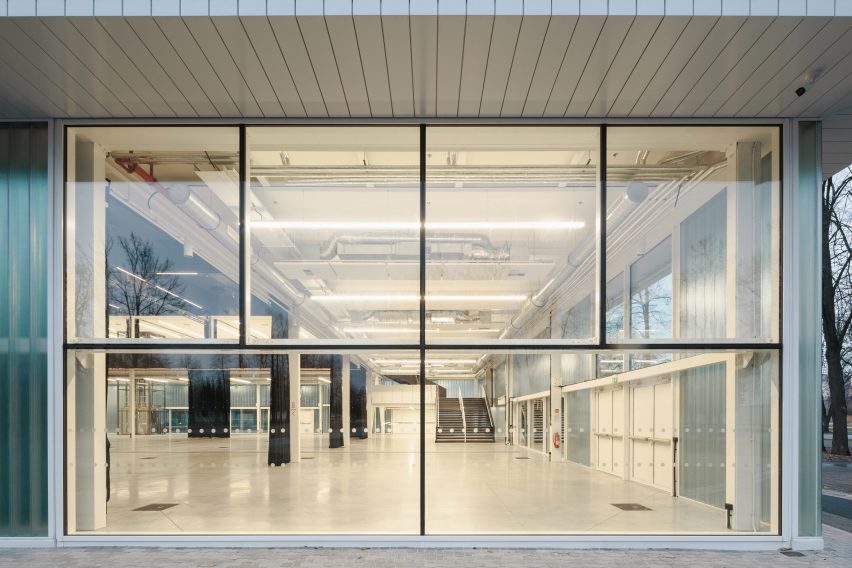 Photograph of detail of building side showing interior through window