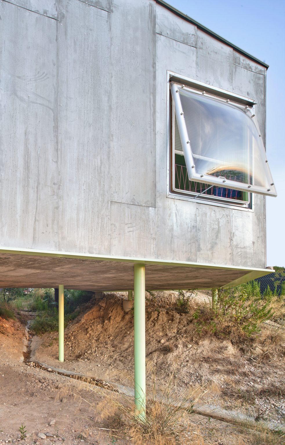 Building volume raised off the ground at Rambla Climate-House by Andrés Jaque, Office for Political Innovation and Miguel Mesa del Castillo