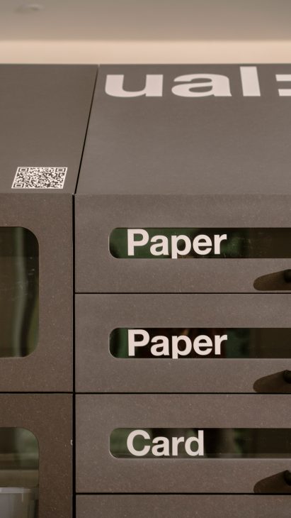 Close-up of UAL storage unit with labels reading paper and card