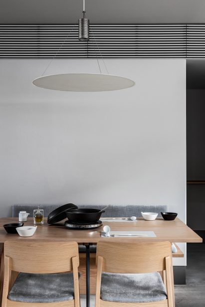 Washi paper lamp about table in restaurant