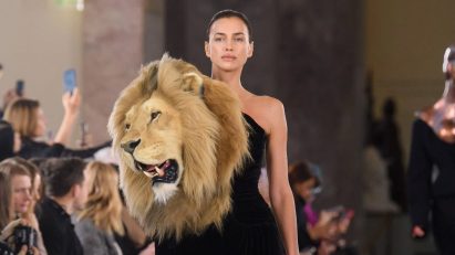 Schiaparelli faux taxidermy lion head on black dress
