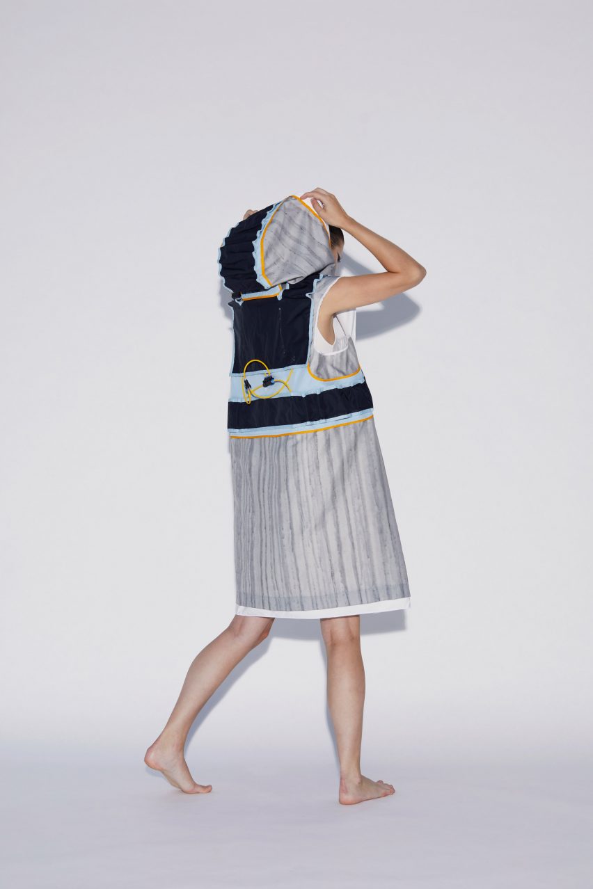 Model wearing Soft Assembly hooded vest by Pola Demianiuk