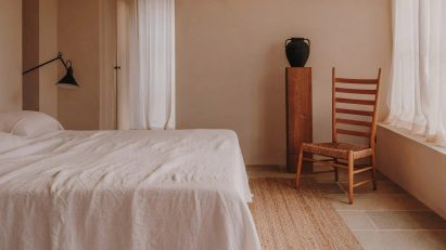Earthy bedroom interior with wooden furniture