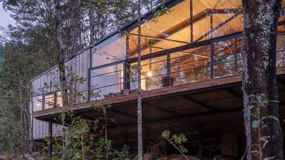 Exterior of Quilanto House in a forest by Hebra Arquitectos