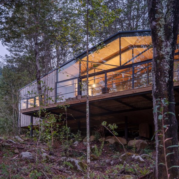 Exterior of Quilanto House in a forest by Hebra Arquitectos