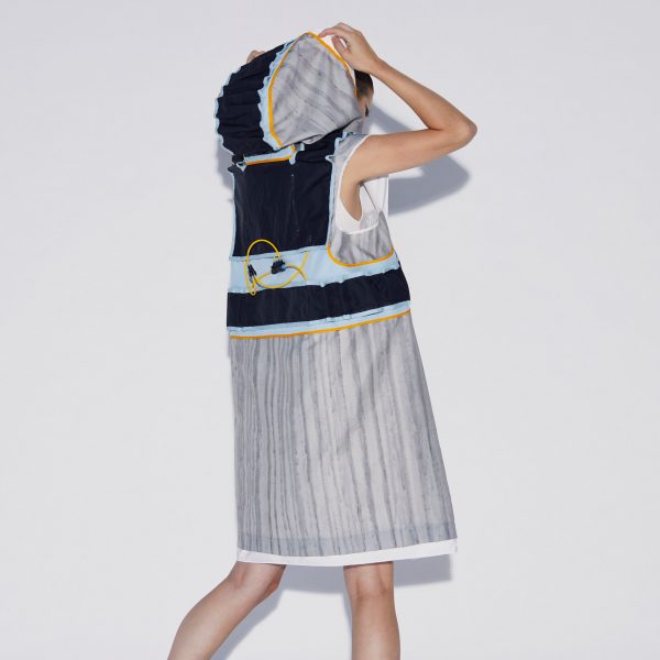 Model wearing Soft Assembly hooded vest by Pola Demianiuk