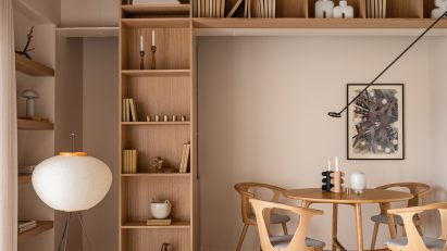 Interior shelving and dining space in Kyiv apartment by Yana Molodykh