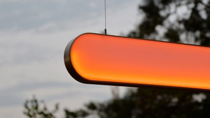 Glowing orange lamp hung up