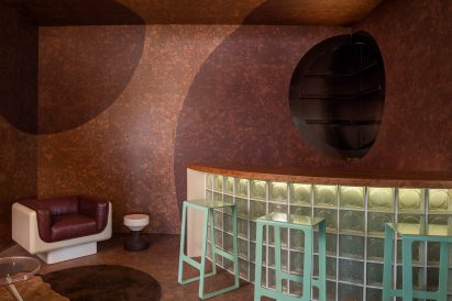 Cave-like bar area lined in cork