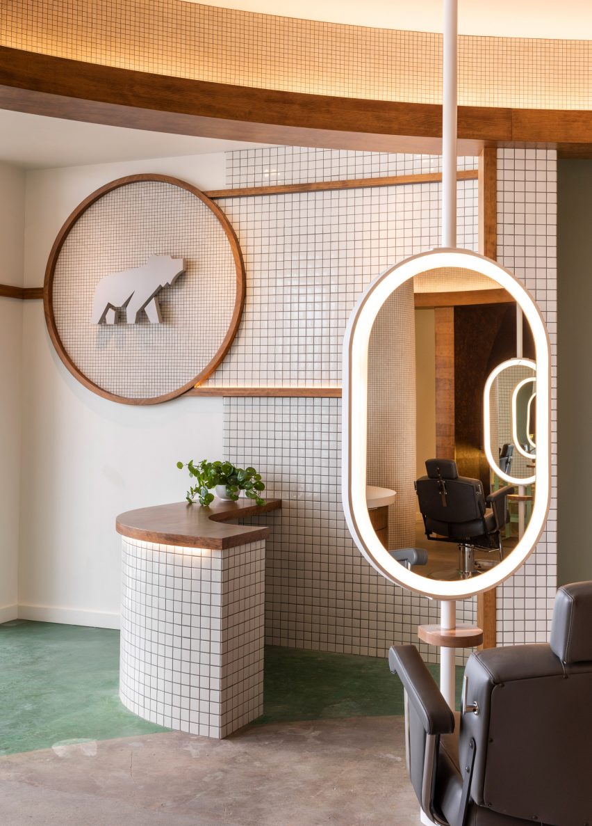 Reception area with white mosaic tiles