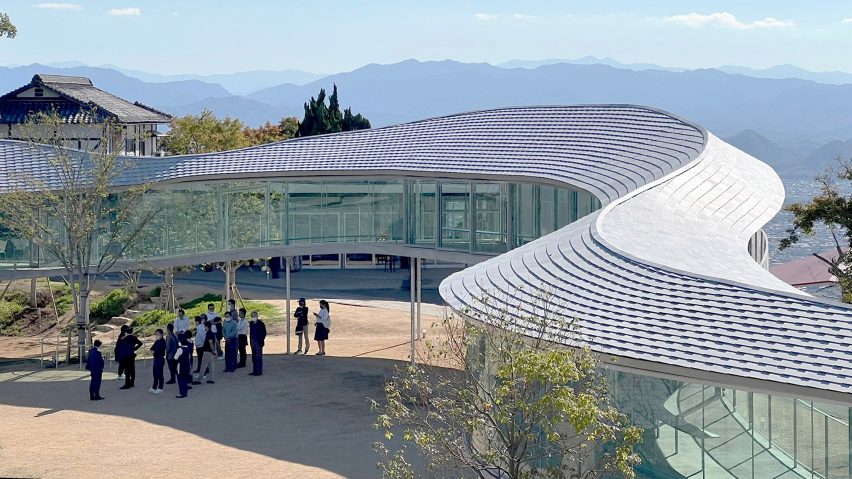 Roofscape of Yashima Mountaintop Park winding walkway in Japan by SUO
