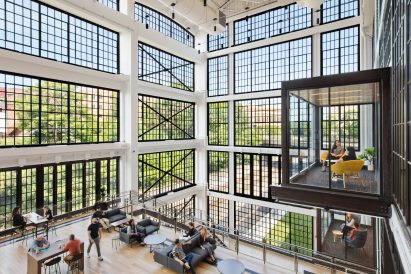 Cantilevering glass vestibule at laboratory by ZGF