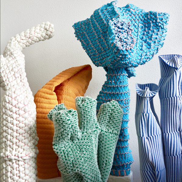 Textile-based sculptures in white, orange, blue, green and purple