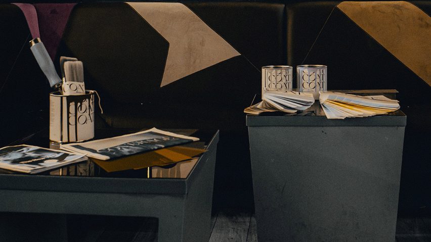 Photo of paint tins of a table