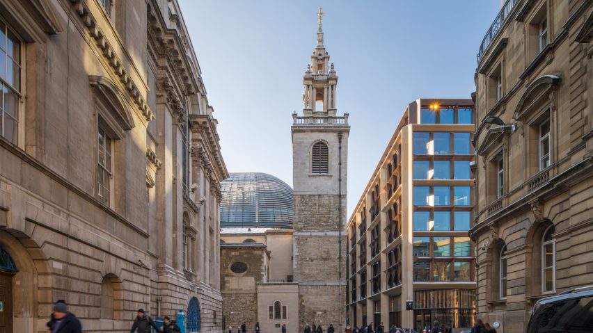 Photo of a church and modern buildings