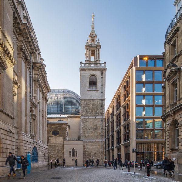 Photo of a church and modern buildings