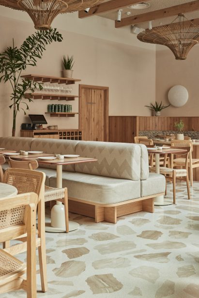 Seating area and terrazzo floor of Milk Beach Soho