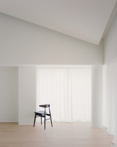 White interior with white curtains