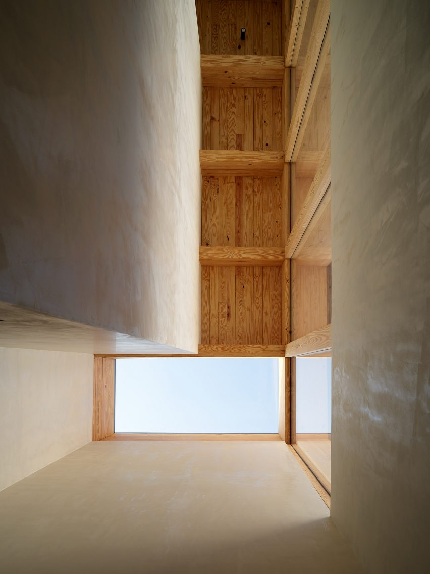 Circulation space with skylight and timber ceiling