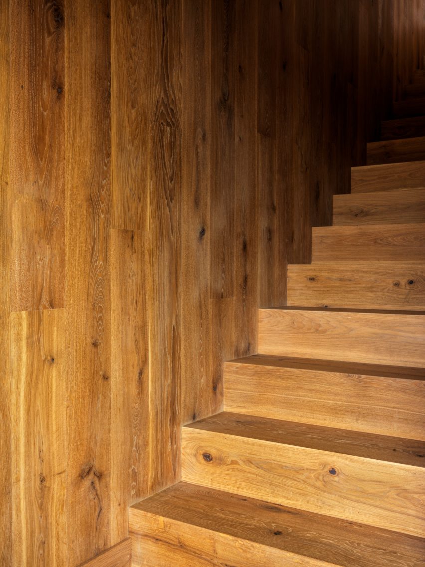 Timber staircase with timber-clad walls