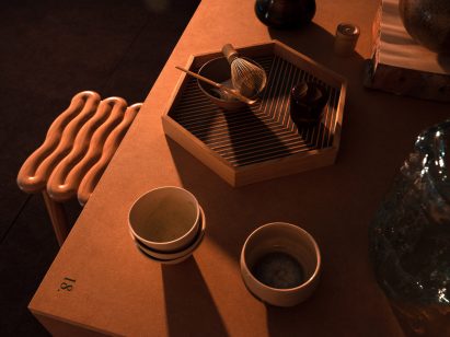 Photo of dimly lit tabletop with items on it