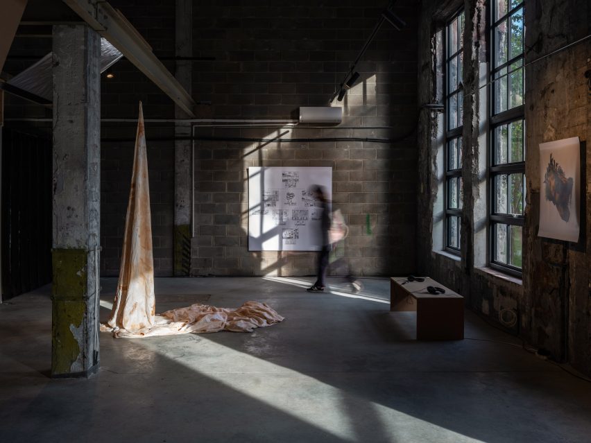 Photo of industrial loft space with large windows