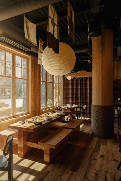 Paper lantern above bench seating