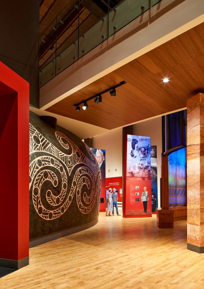 Interior museum gallery space with wood floors