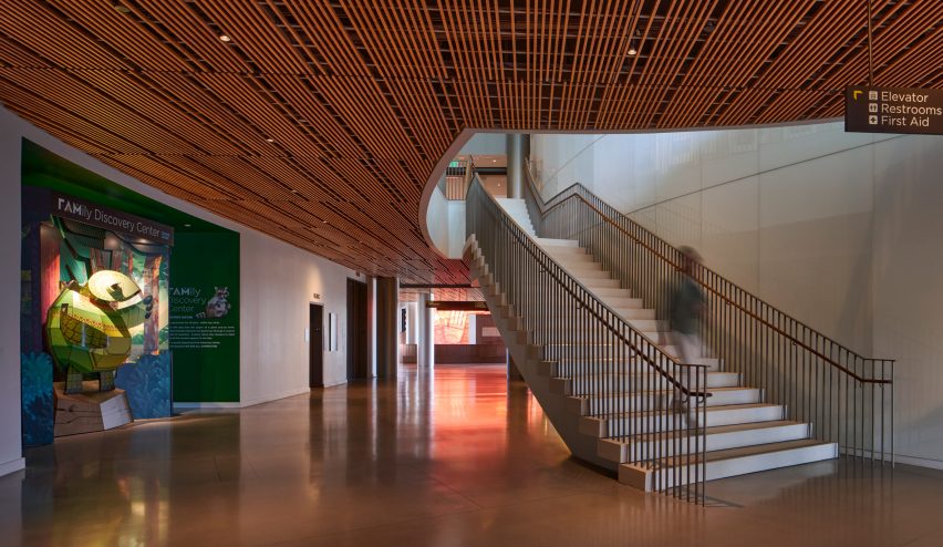 Interior of the First Americans Museum with concrete floor, timber ceiling and wide staircase