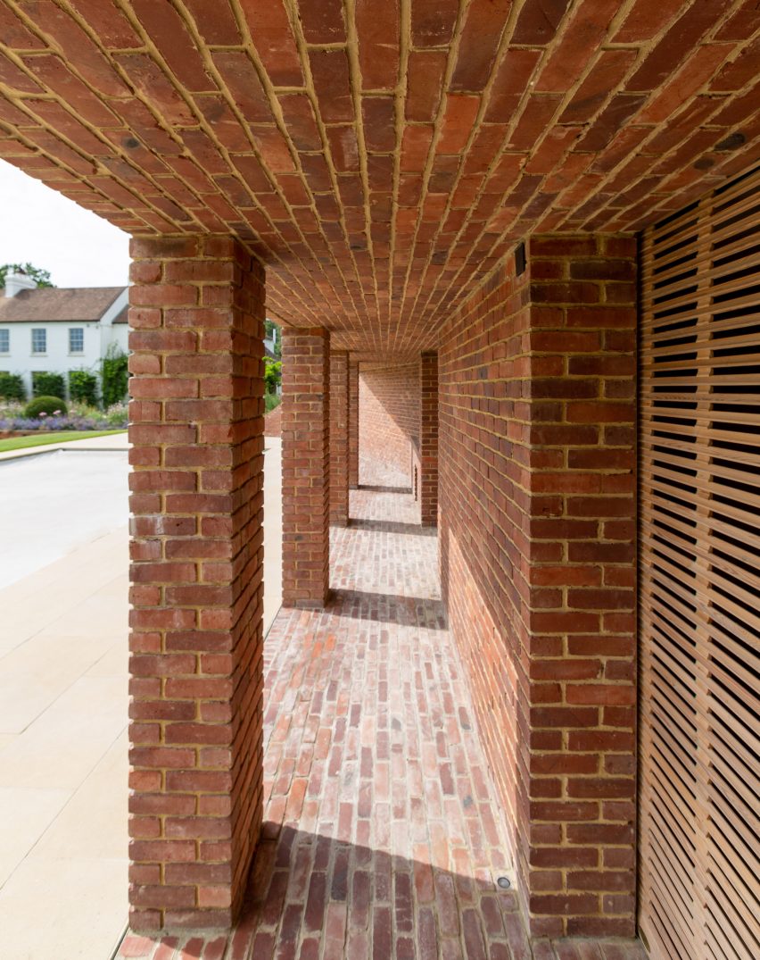 Brick pool house in the garden of a Georgian house in Kent