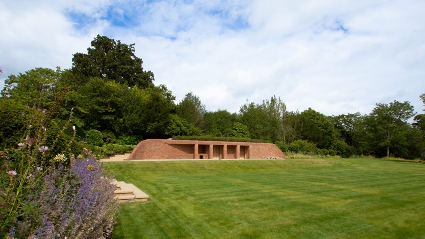 Brick pool house in the garden of a Georgian house in Kent