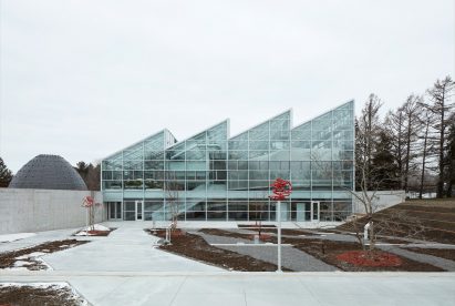 Saw-tooth roof building housing an insect zoo and museum in Montreal, Canada
