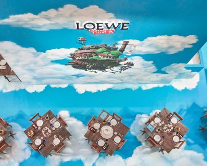 Aerial view of tables with spindly legs at Loewe installation at Dolly's Cafe