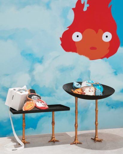 Howl's Moving Castle character-shaped cookies on custom tables