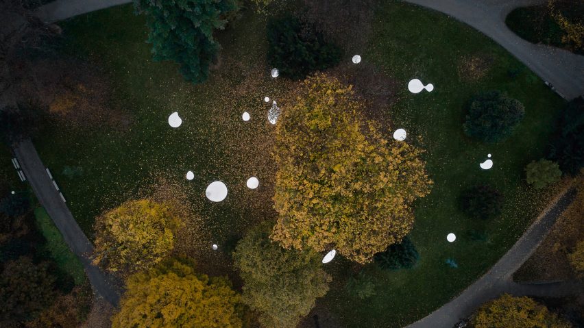 Aerial photograph of mirrors on ground around trees