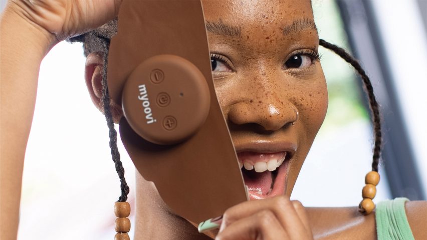 A brown Myoovi period pain relief device