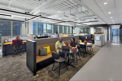 Concrete flooring and beige carpeting within NHL headquarters